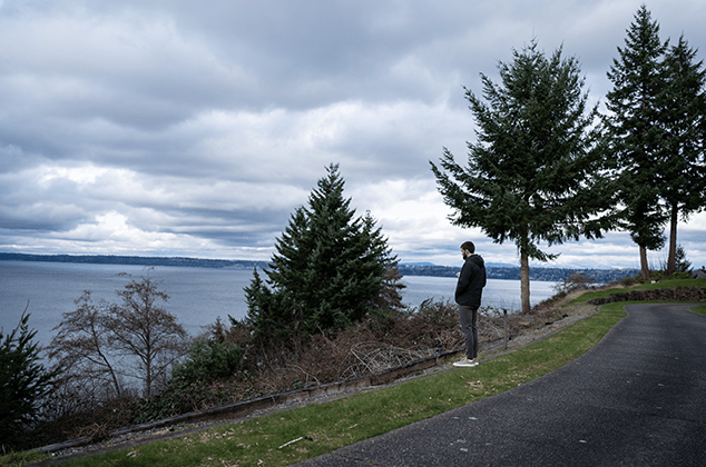 A man looking at the Puget Sound while at the 2024 Crozier Lenten Retreat