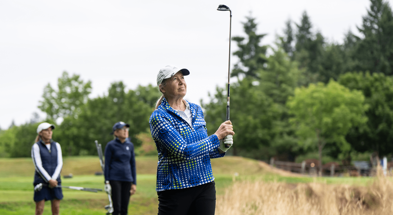 Women playing golf